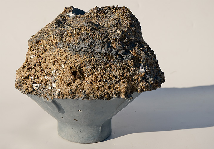 An upside-down blue vessel