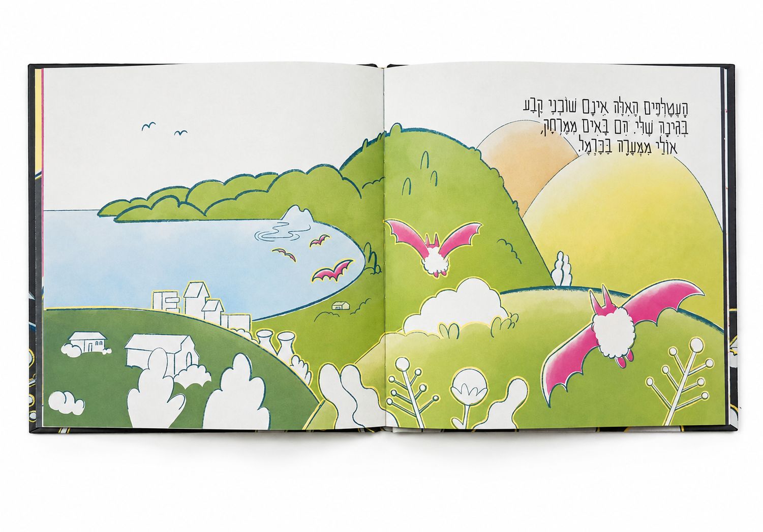 An illustrated spread from a children’s book, featuring bats flying over a green landscape of hills, houses, and the sea at dusk.
